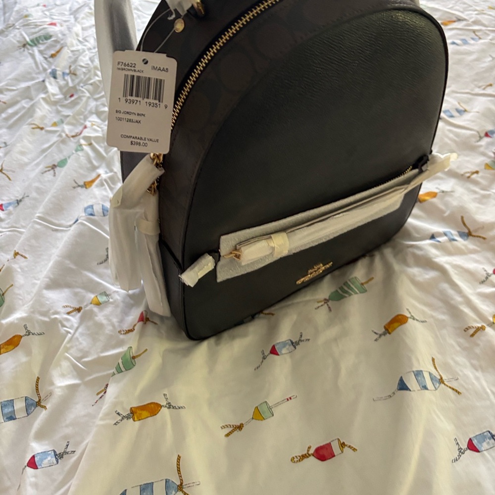 Coach Jordyn Black Backpack with signature detail